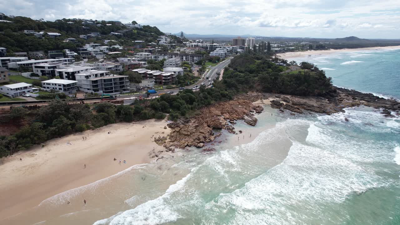 Flying Towards The Beach And Hotels Along The Coastal Road In Sunshine Coast, QLD, Australia. - aerial shot