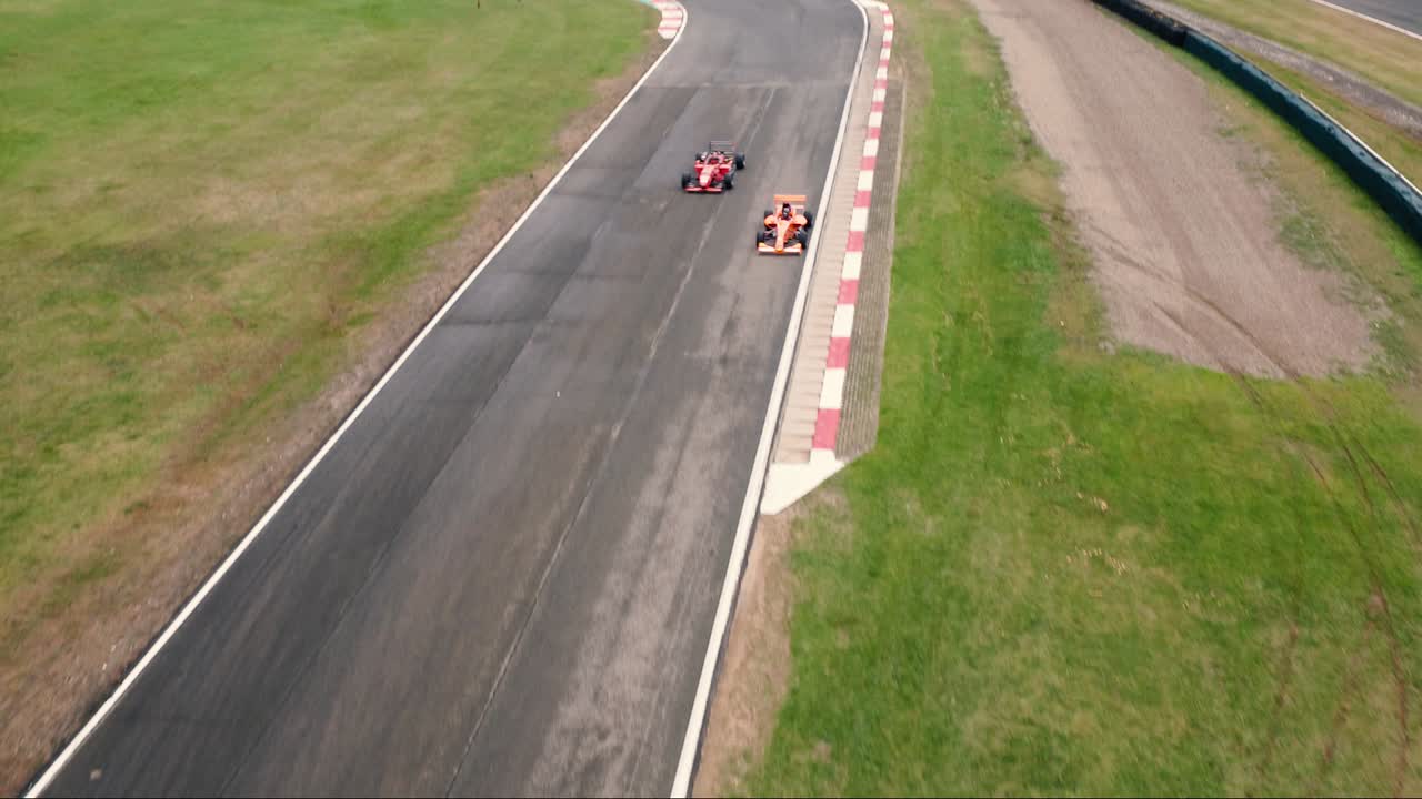 Race car overtaking on a track suitable for the practice of the sport.