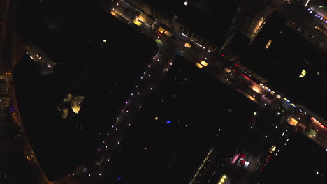 Aerial-Bird-Eye-View-Top-View-of-Frankfurt-am-Main,-Germany-Streets-at-Nights-with-City-Lights