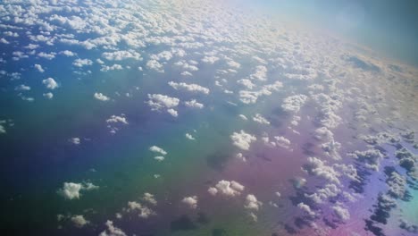 colorful sea with cirrocumulus clouds from above in the atlantic ocean in a dreamy mood