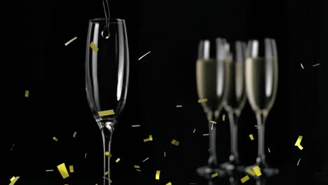 Animation-of-champagne-glasses-and-confetti-falling-on-black-background