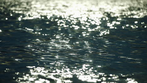 water ripples with sunlight reflections