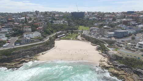 people at small cove beach of tamarama - tamarama beach park in sydney, nsw, australia