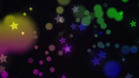 animación de estrellas y puntos coloridos que se mueven sobre un fondo negro