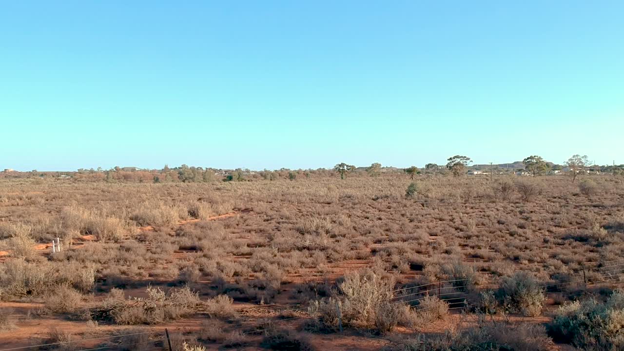 Flying over a sign leading into Broken Hill