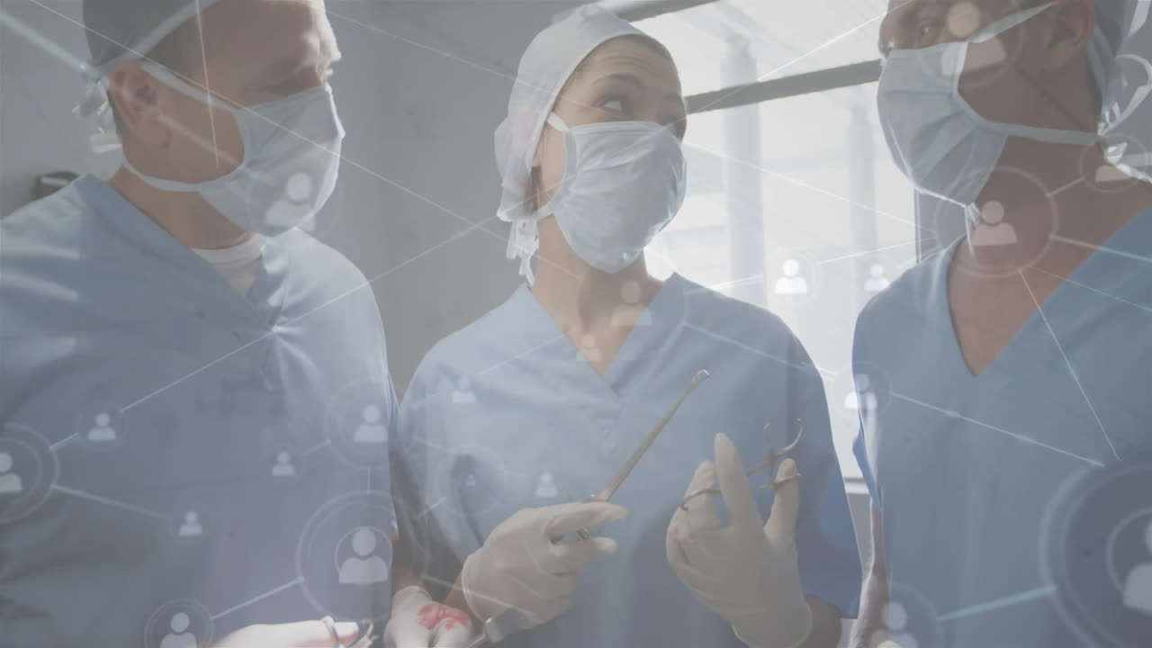 Discussing surgery over network connections, medical professionals in animated meeting