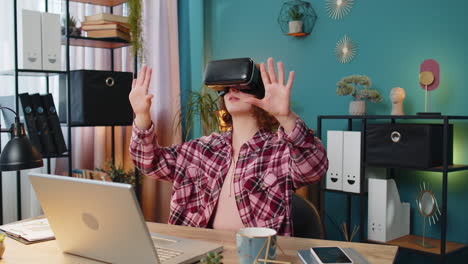 business woman using virtual reality online vr app headset to simulation 3d at home office workplace