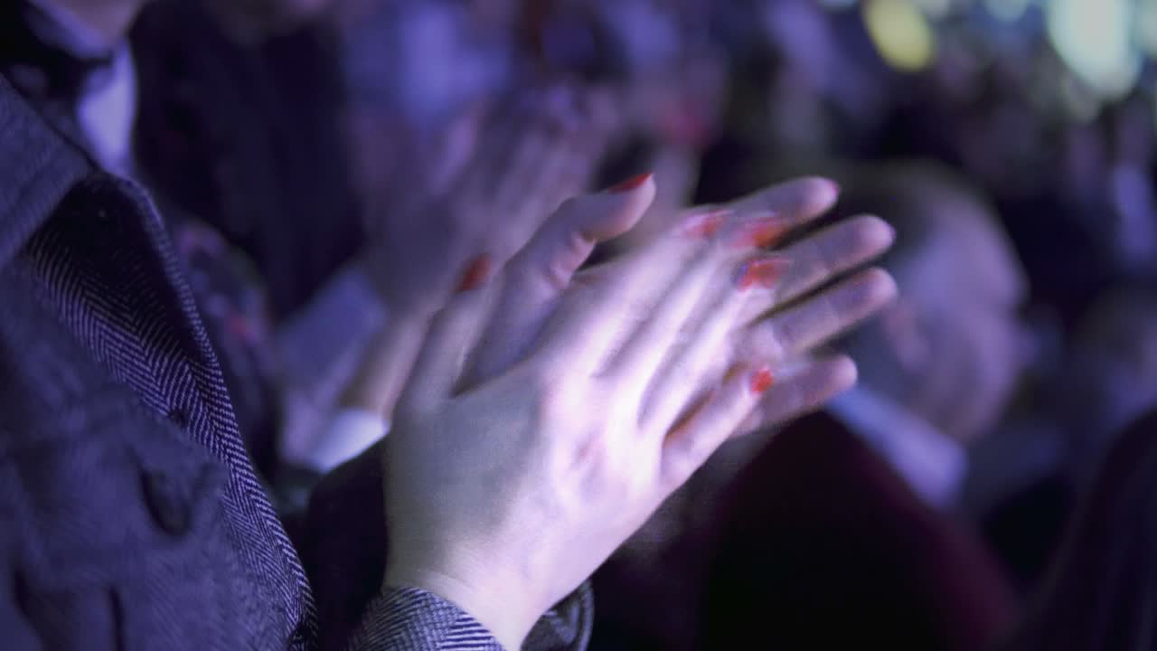 Business woman cheering clapping hands at coference meeting