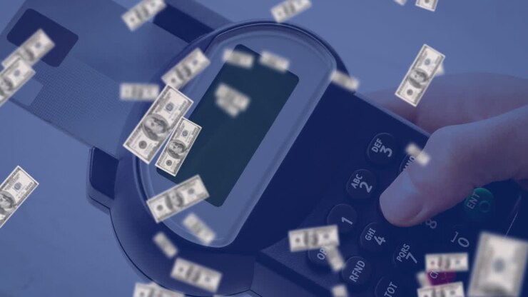 Animation of american dollar bills falling over payment terminal