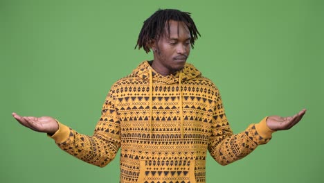 young handsome african man choosing between left and right