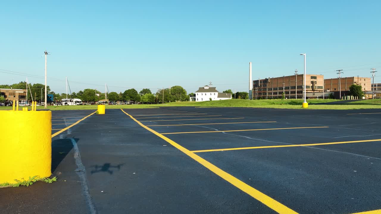 Slow motion movement, drone's shadow pulling into frame
