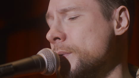 Close-Up-Of-Man-Singing-During-A-Live-Music-Performance-1