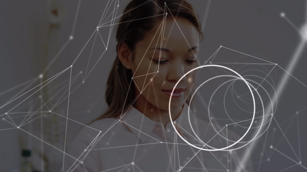 Animation of network of connections over female biracial female doctor