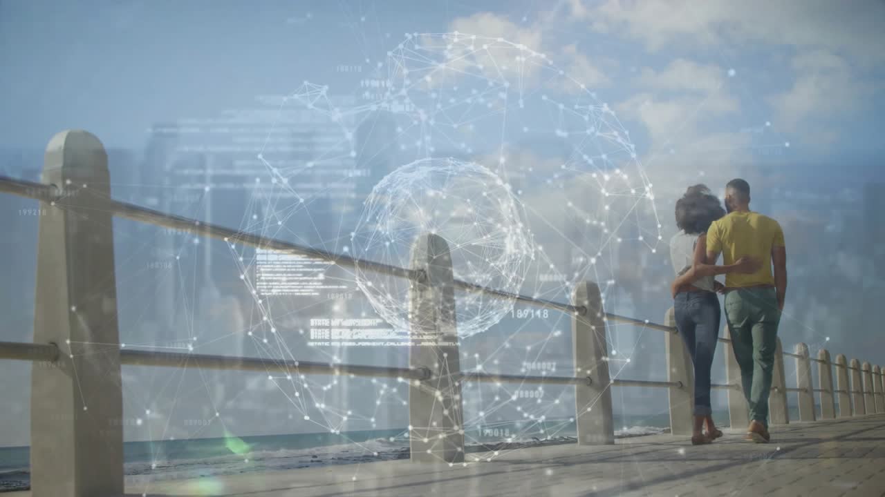 Couple walking arm in arm on boardwalk, holographic globe appearing and mapping tech connectivity
