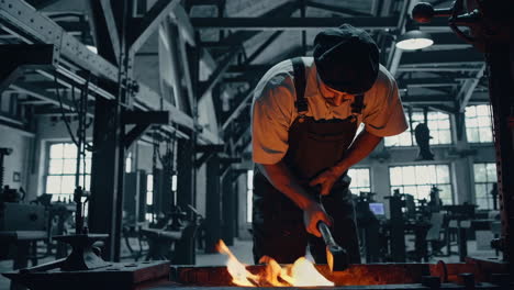 blacksmith at work in a historic factory