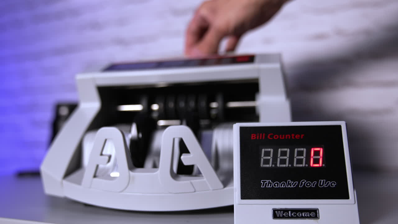 Empty banking modern counter. Special machine for counting banknotes. Money and business concept. Cropped view