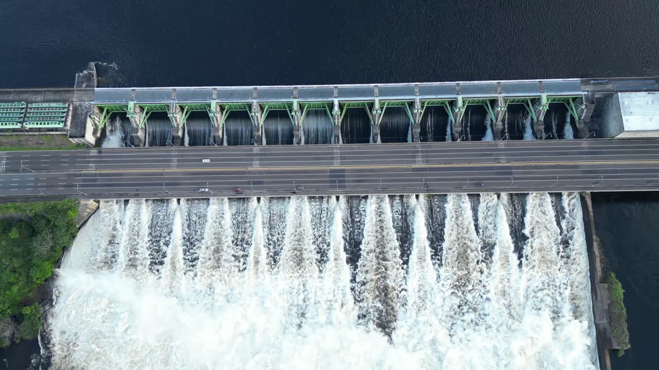 AERIAL SHOT ON A BIG DAM IN VEENEZUELA WITH A DRONE GOING UP