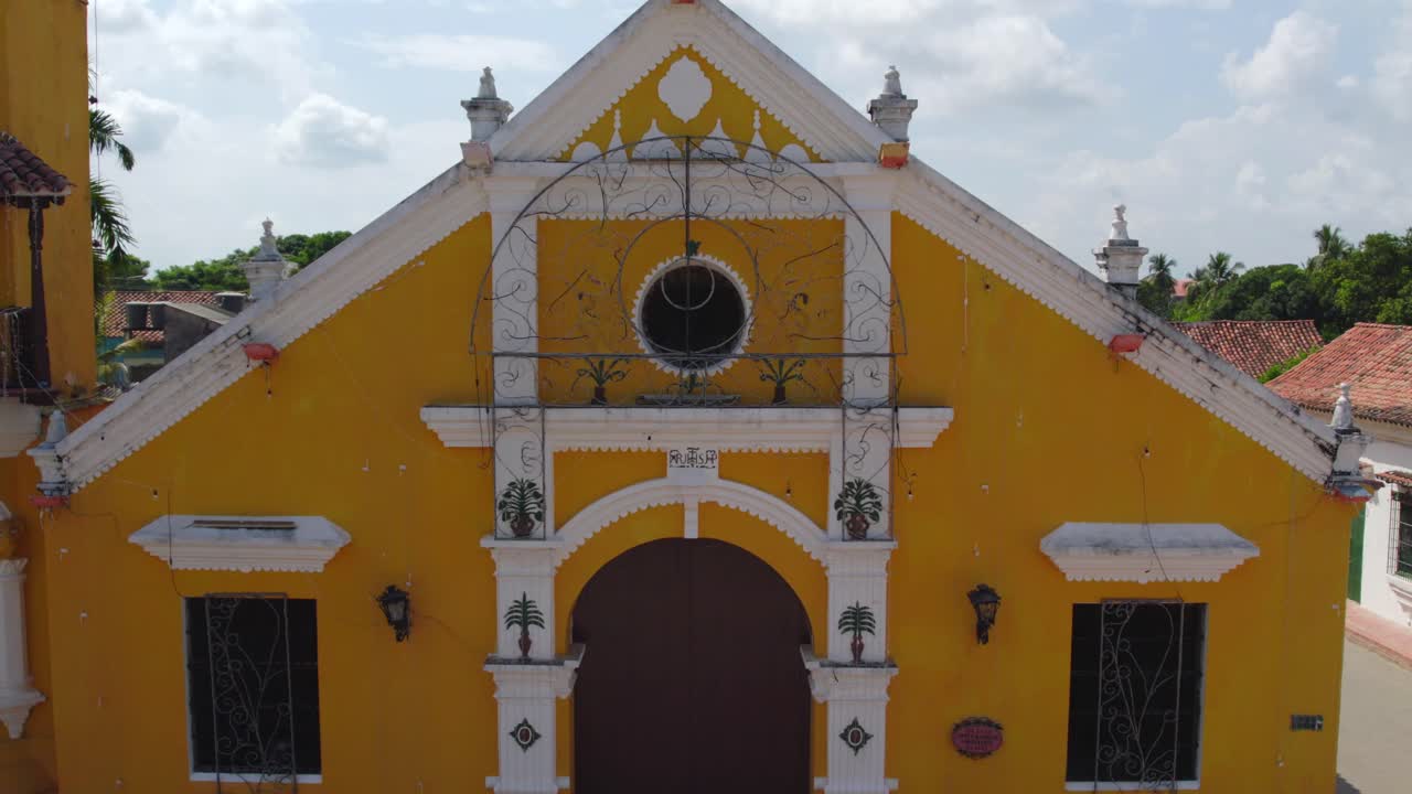 Its distinctive white facade, adorned with baroque details and vibrant accents, radiates elegance and charm.