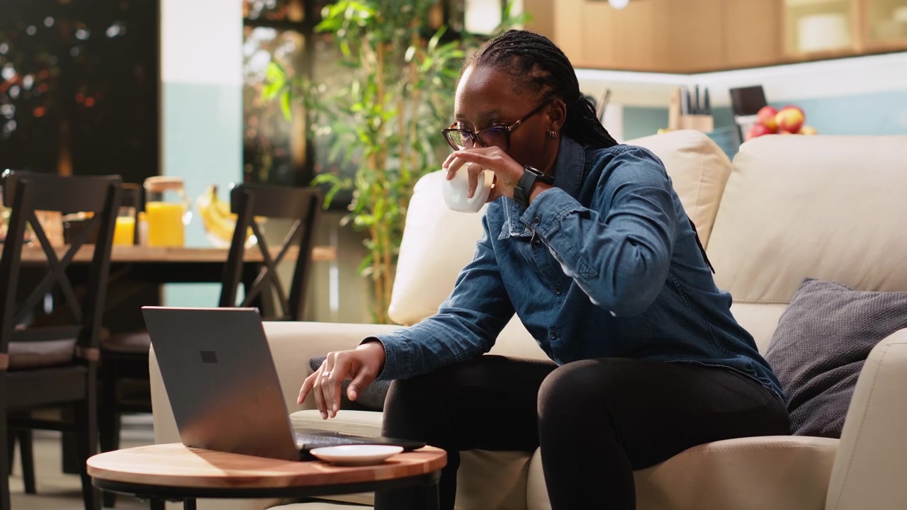 Stressed woman checking hour on wristwatch for time management