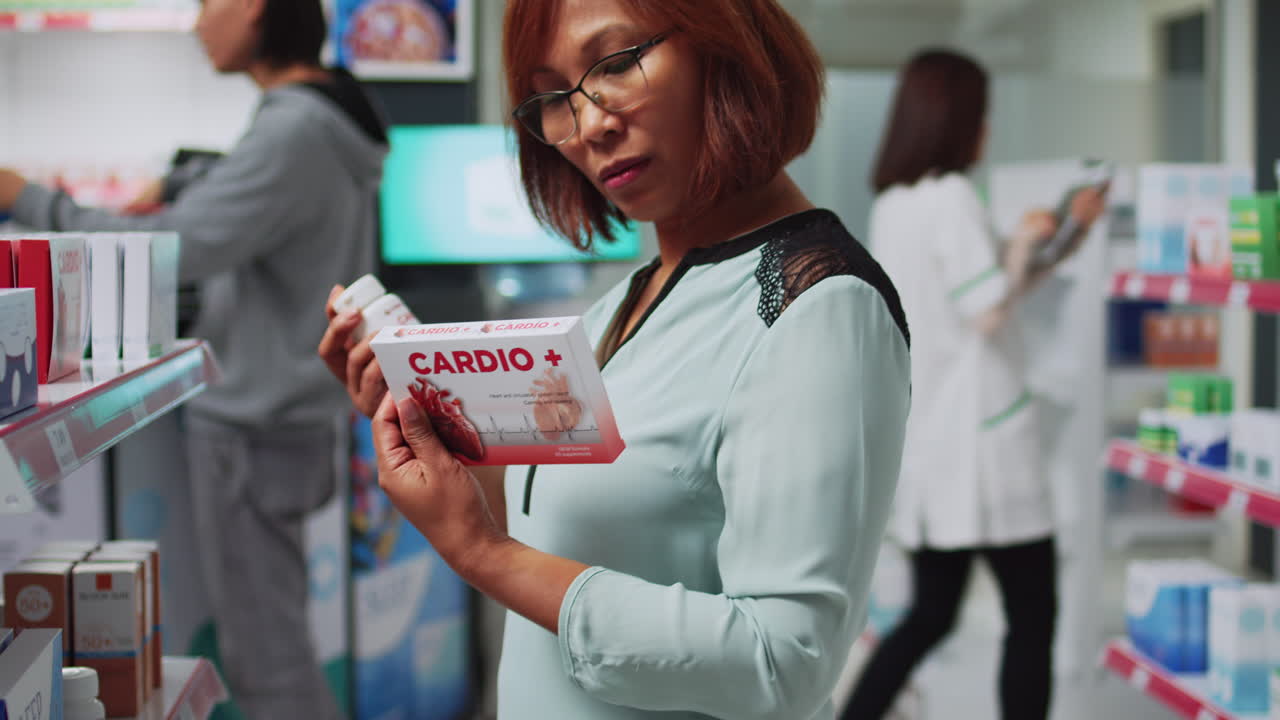 Woman shopping for medication at a pharmacy