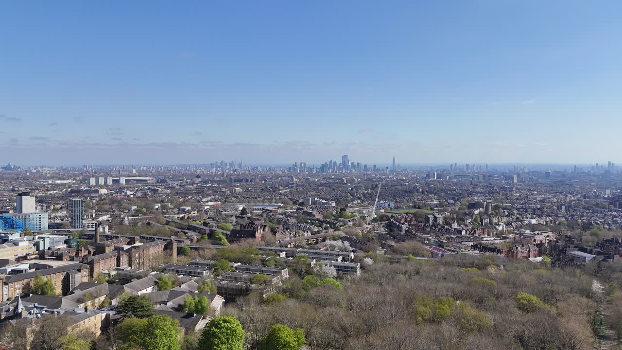 Panning drone aerial London city skyline viewed from Highgate
