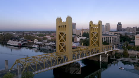 golden tower bridge spanning the sacramento river at twilight