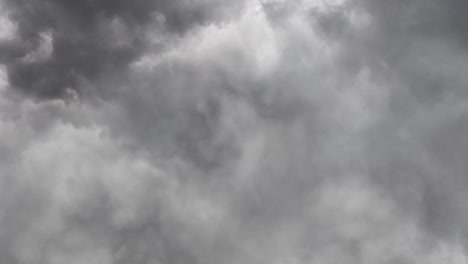 view of  thunderstorm inside dark clouds background