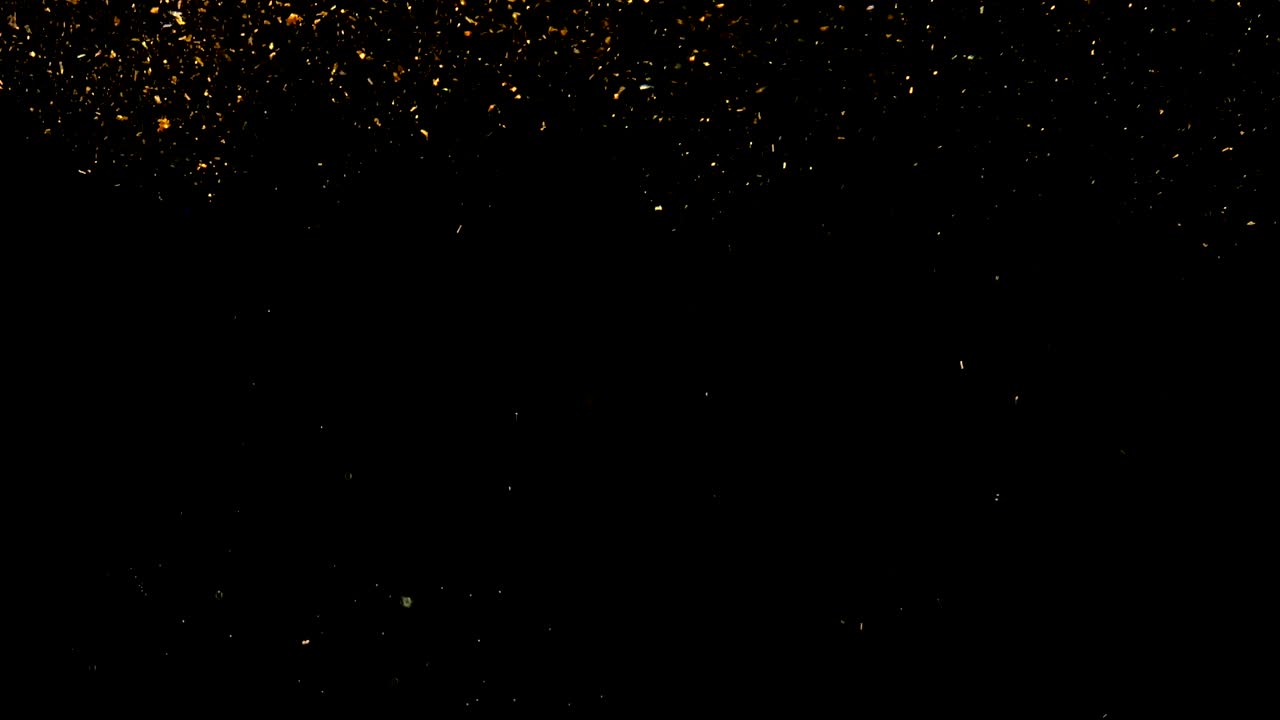 Abstract background with golden shiny sparkling sparkles