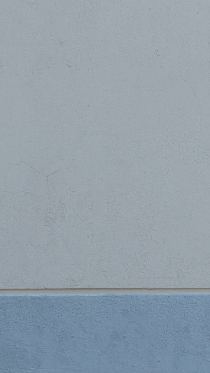 Light blue textured wall exterior