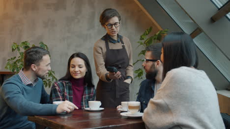 friends having coffee in a cafe