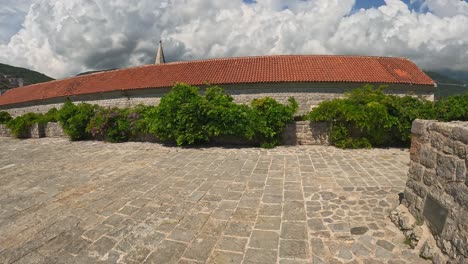 historic budva stari grad montenegro with castle walls and bay waters in europe