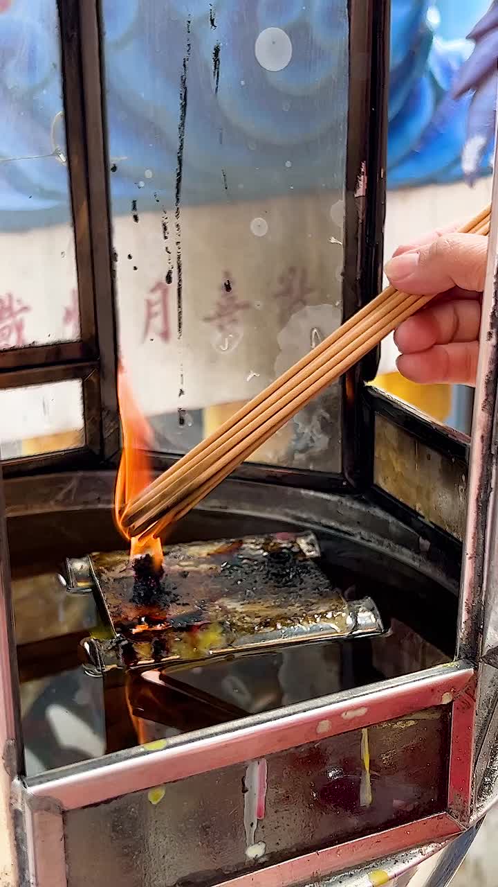Incense lighting ritual in Chonburi, Thailand