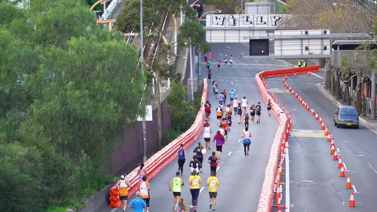 Marathon Runners in City Street
