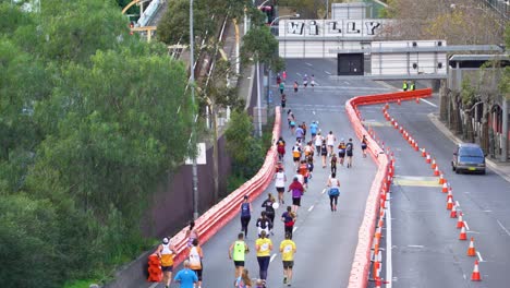 marathon runners in city street