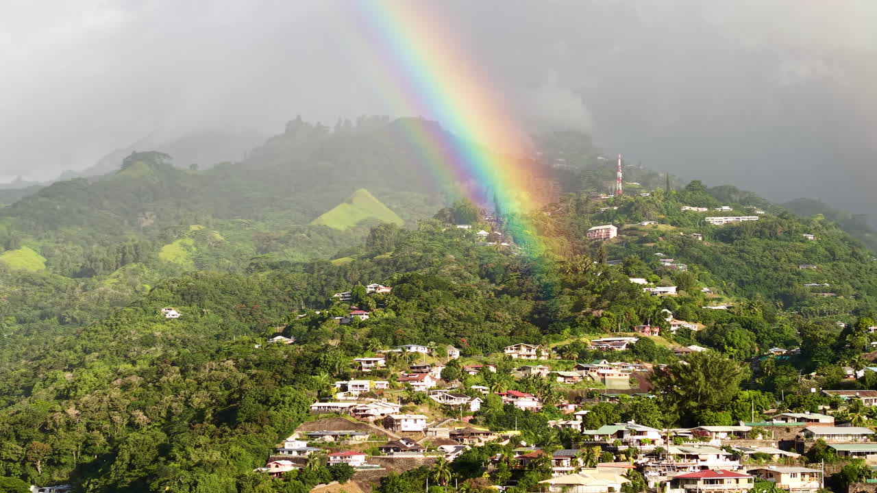 Drone SHot of Real Rainbow Above Hills of Tahiti Island and Papeete City, French Polynesia