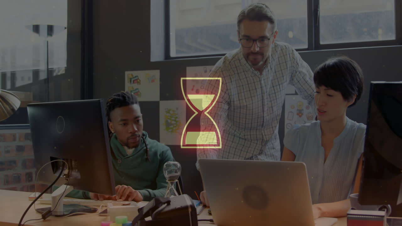 Team collaborating on project in modern office with glowing bowtie animation