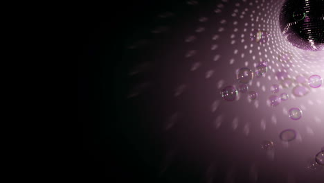 Shiny-disco-ball-revolving-with-floating-bubbles