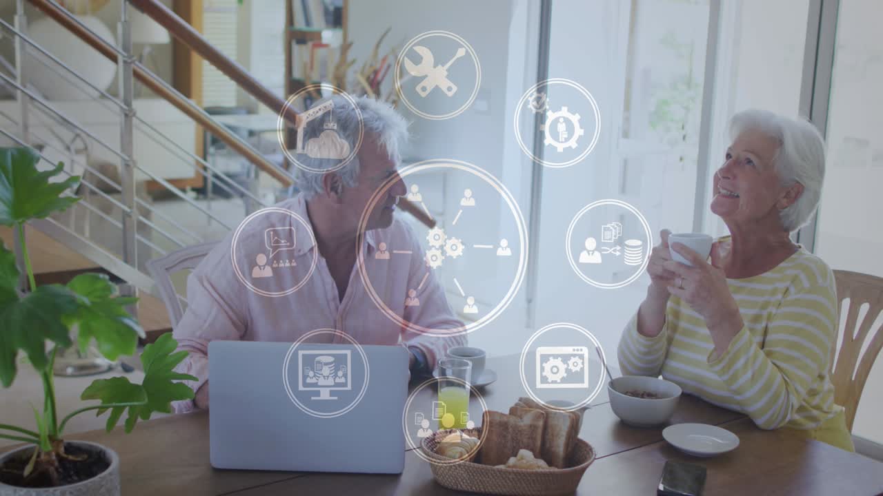 animación de la red de conexiones sobre una pareja caucásica mayor usando una computadora portátil