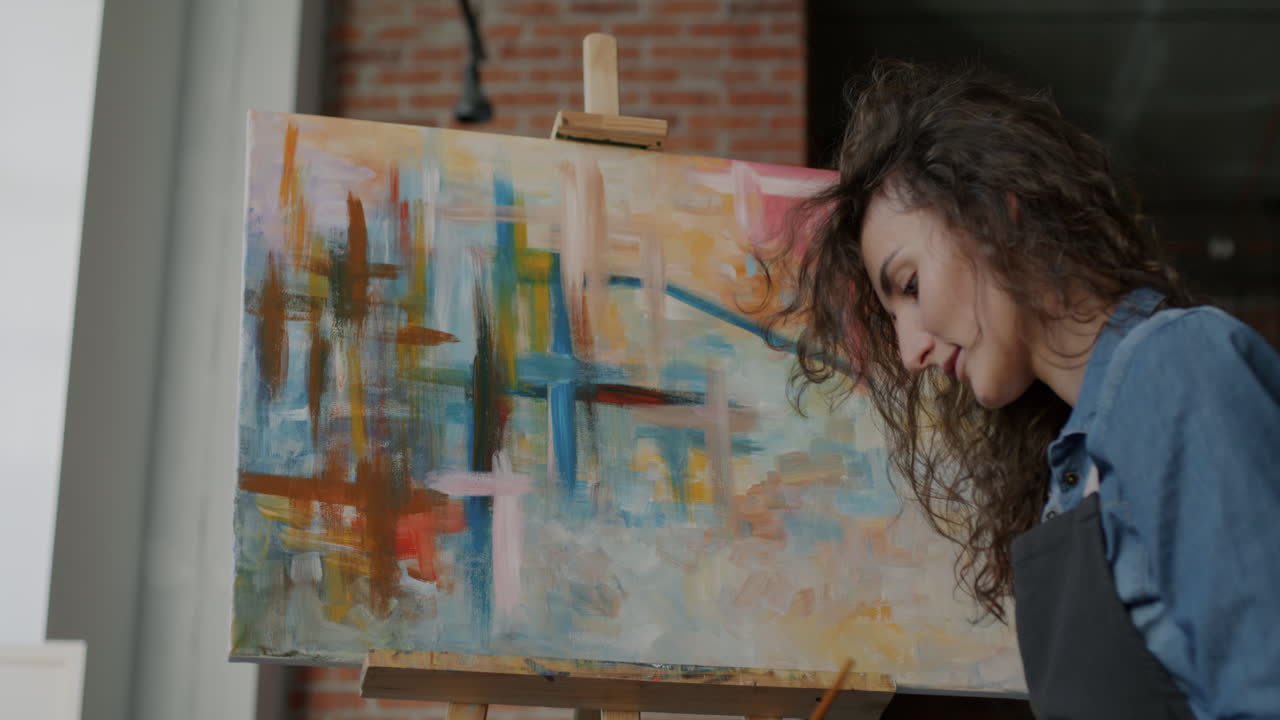 Woman Painting in Abstract Style