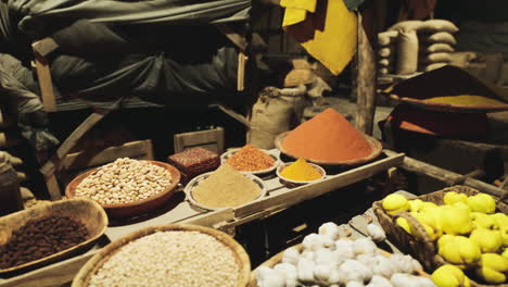 vibrant display of spices and ingredients at an old national african market