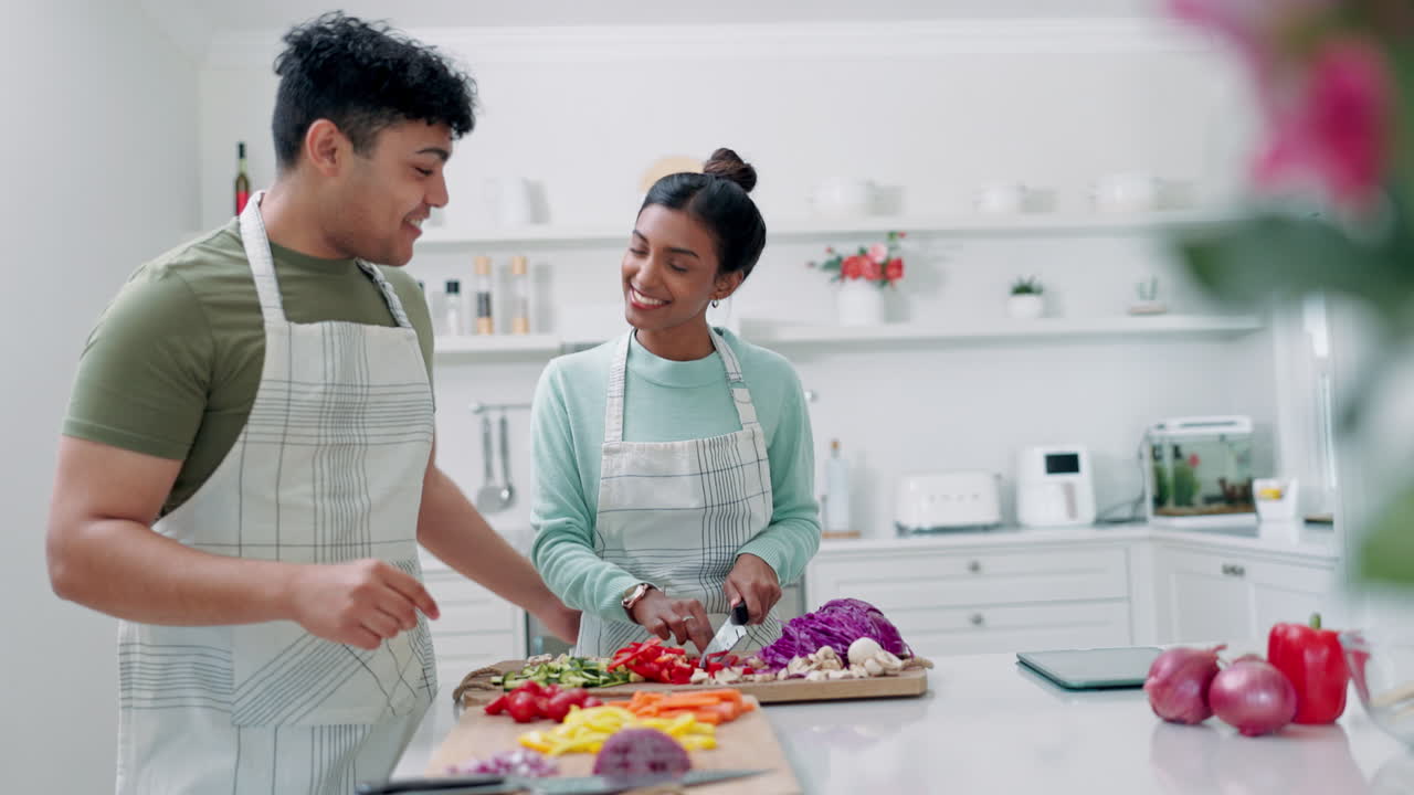 Cooking, couple talk and hug with kitchen