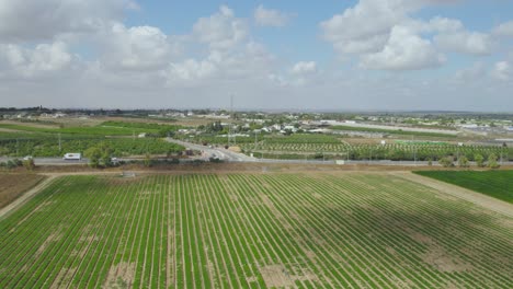 green fields aerial shot at sdot negev settlement's, israel