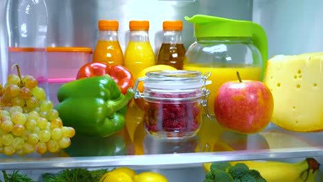 open refrigerator filled with food