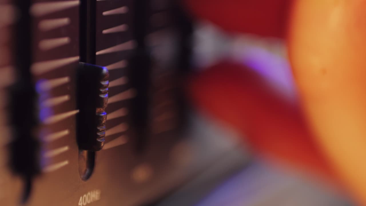 Retro fm am radio tape, music, technology, people and equipment concept - man using mixing console in sound recording studio