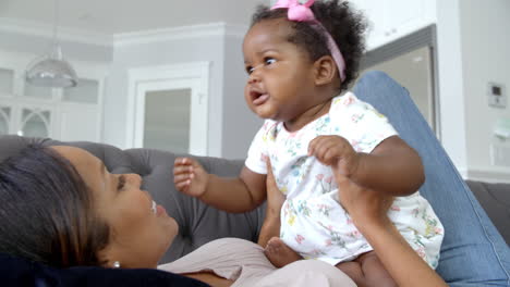 Slow-Motion-Shot-Of-Mother-Playing-With-Daughter-At-Home