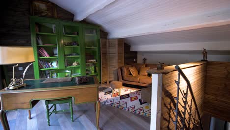 slow establishing shot of an antique office within an attic in a villa