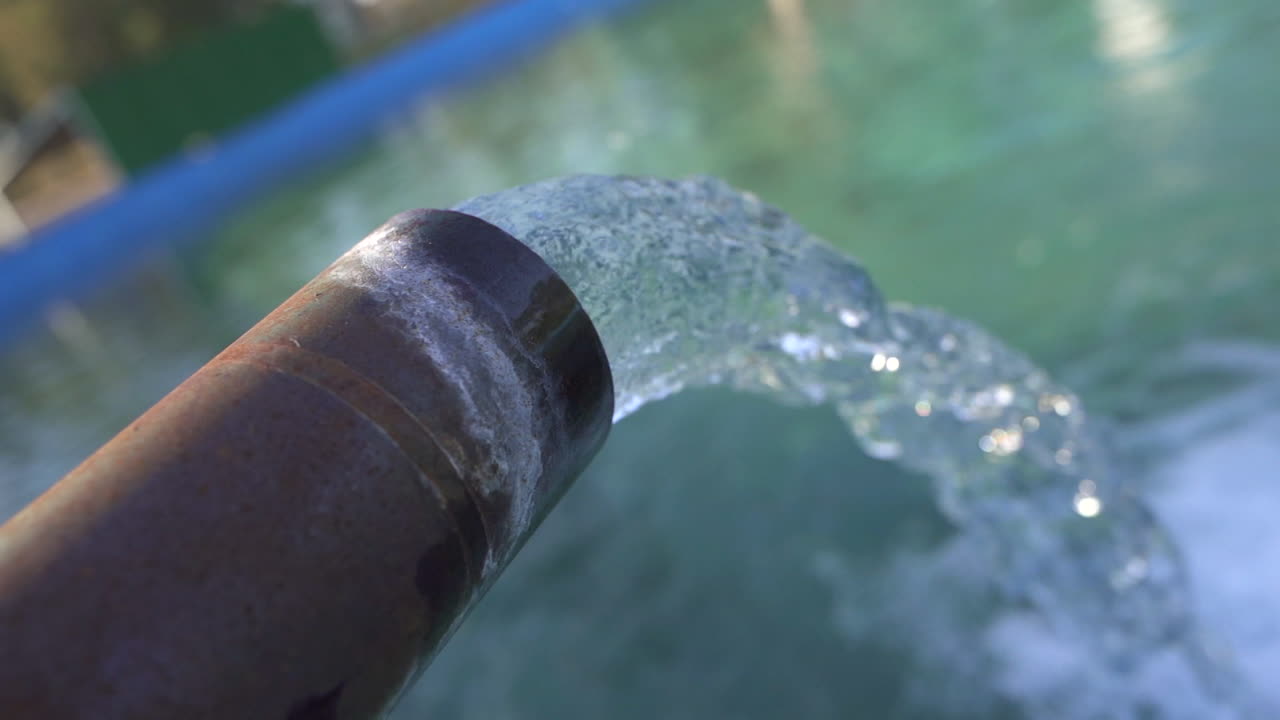 Water flowing from a pipe