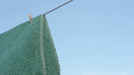 towel blowing in the breeze on  washing line