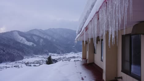 Winter-in-Japan,-Snow-on-Landscape-and-Ice-Forming-on-Lodge-4k