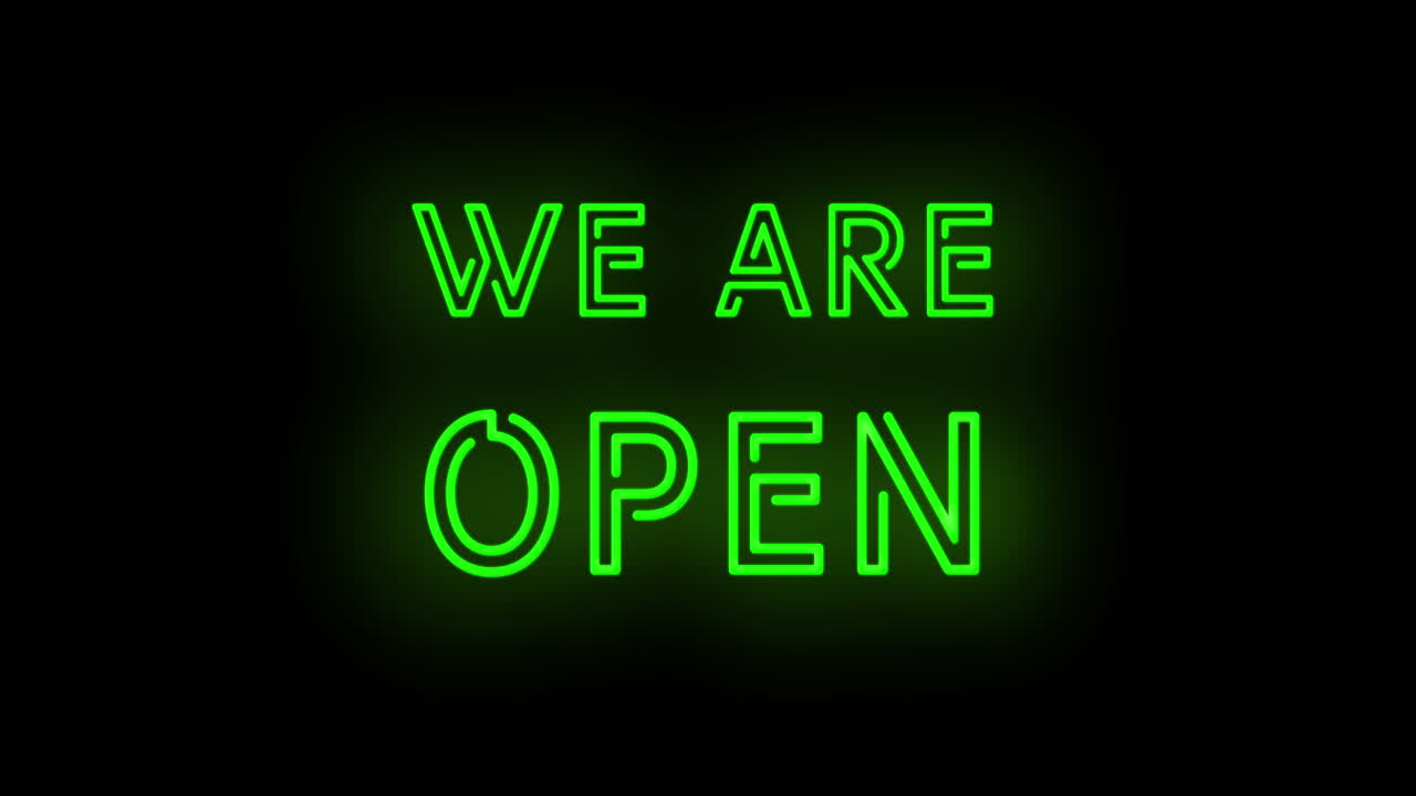 Papan neon hijau 'KAMI BUKA' berkedip-kedip.